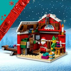 a lego christmas scene with santa's workshop