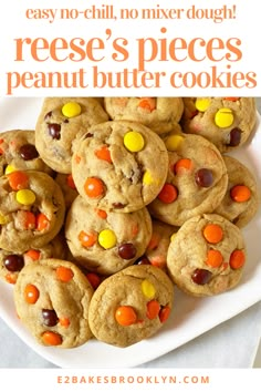 reese's pieces peanut butter cookies on a white plate with text overlay that reads easy no - chill no mixer dough