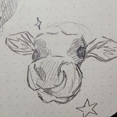 a drawing of a cow's head with stars around it and the bottom part of its nose