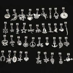 40 pieces: Assorted European bead dangle charmsMaterial: antiqued silver alloyAssorted sizes5mm bead hole Rope Bracelets Diy, European Bracelet, Bead Dangles, Beads For Sale, Arts And Craft, Beaded Jewelry Patterns, Charm Set, Religious Jewelry, Dangle Charms