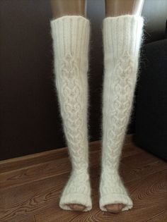 High socks are knitted from angora with the addition of nylon (for durability). Angora yarn is made from angora rabbit down, so the socks are very soft and delicate. These long socks are warm, cozy and fluffy. Look how These socks can be called stockings) You can wear them when doing household chores or when watching TV on the couch. You will look very impressive! Dress them in bed and you will be warm, soft and cozy. I knit with premium quality yarn. The fingerless socks are suitable for yoga d Soft White Knee-high Socks For Winter, Comfortable Warm White Knee-high Socks, White Knee-high Comfortable Leg Warmers, Comfortable White Knee-high Leg Warmers, White Warm Knee-high Socks, Warm White Knee-high Socks, Winter White Knee-high Stockings, White Knee-high Winter Stockings, Cozy Thick White Socks