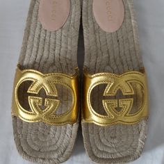 All Of My Items Are Guaranteed 100% Authentic You Are Looking At A Beautiful Designer Pair Of Sandals Made By Gucci Size 39.5 And 40 Heels .75" Leather Uppers And Accented With Cut Out Interlocking Ggs Brand New With Box, Gucci Cards And Dust Bag Gucci Slide Heels, Gucci Perforated G Sandal, Gucci Luxury Beach Sandals, Gucci Gold Leather Sandals, Luxury Gold Slip-on Sandals, Gucci Gold Designer Sandals, Designer Gucci Gold Sandals, Designer Gold Closed Toe Sandals, Designer Gold Flat Sandals