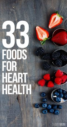 berries, raspberries and strawberries in metal bowls with the words 33 foods for heart health