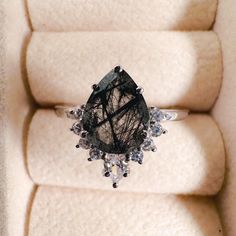 Pear shaped Black Rutilated Quartz engagement ring vintage White Gold engagement ring Diamond Bridal Anniversary gift for women >Ring details: - Style - Art deco - Metal Type: 925 Sterling Silver, 14K White Gold, 14K Rose Gold , 14K Yellow Gold - Center Stone: Black Rutilated Quartz - Color: Black  - Ring Size: I offer more than one (Contact us if your ring size is not available in the listing) - Gemstone Size:- Main Stone: 6x8mm. Makes a Wonderful Gift for your Girlfriend, Wife, Mom or Simply an Excellent Addition to Your Jewelry Collection -100 % Handmade -100% Original Design ---> ❥ STYLE STATEMENT This Ring would be perfect to match up with any of your attires. These will surely add more oomph to your outfits. ---> 🎁 GIFT WRAPPING * We can also create gift notes! You can let us know b Rutilated Quartz Engagement Ring Gold, Black Rutilated Quartz Engagement Ring Silver, Black Rutile Quartz Engagement Ring, Gold Engagement Ring Diamond, Rutilated Quartz Engagement Ring, Black Rutilated Quartz Engagement Ring, White Gold Engagement Rings Vintage, Quartz Engagement Ring, Quartz Color