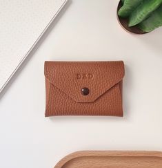 Our leather coin pouch is the perfect accessory to show your personal style.  This handmade leather wallet combines craftsmanship, functionality and beauty in the little things. Handmade in our small workshop with full grain leather.  This personalized coin purse is super functional, in it you can carry coins, cards, bills or keys. You'll use it to keep all your essentials with you.  Details: - Available in leather in 14 different colors. - Approximate dimensions: 10cm x 7cm (3,94" x 2,75") - Yo Leather Envelope Coin Purse As Gift, Leather Card Holder With Coin Pocket As Gift, Classic Envelope Coin Purse Gift, Minimalist Leather Trifold Wallet Gift, Minimalist Leather Coin Purse For Gift, Minimalist Leather Coin Purse As Gift, Minimalist Brown Wallets As Gift, Minimalist Bifold Coin Purse As Gift, Brown Card Holder With Coin Pocket For Gift