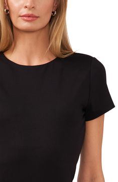 This sleek and classic T-shirt is cut from ultrastretchy body-sculpting fabric to enhance your natural shape. 24" length (size Medium) Jewel neck Short sleeves Partially lined 90% polyester, 10% spandex Machine wash, tumble dry Imported High Stretch Smoothing Solid Color Tops, Solid Stretch Tops With Smoothing Details, Solid Stretch Smoothing Top, Elegant Fitted T-shirt With Scoop Neck, Solid Color Smoothing Stretch Top, Modern Seamless Solid Tops, Modern Seamless Solid Color Tops, Solid Top With Smoothing Minimal Stretch, Seamless Second-skin Short Sleeve Tops