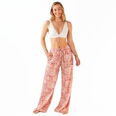 Made from our signature breathable Rayon fabric this casual drawstring pant has an ultrasoft and lightweight feel. Featuring a relaxed fit with a mid-rise elastic drawstring waist and convenient front ✨POCKETS✨, these pants are perfect for the beach or a lazy lounge day! Note: This style runs long. We recommend sizes Small-Extra Large for those 5'6 to 5'10. For those shorter than 5'6, try Petite S/M! Casual Vacation Bottoms With Drawstring, Cotton Loungewear Pants With Tie Waist, Cotton Pants With Tie Waist For Loungewear, Cotton Lounge Pants With Tie Waist, Loungewear Tie Waist Straight Pants, Cotton Bottoms With Elastic Waistband For Vacation, Casual Yoga Bottoms With Comfort Waistband, Relaxed Harem Pants With Elastic Waistband For Loungewear, Wide-leg Tie Waist Loungewear Bottoms