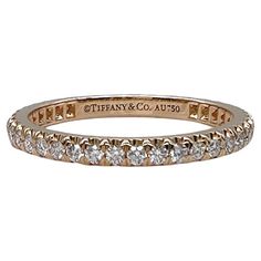 TIFFANY & CO Soleste Full Circle Eternity Band Ring Style: Soleste Ref. number: 60003487 Metal: 18kt Rose Gold Size: 5 Measurements: 2 MM Main Diamond: 40 Round Brilliant Diamonds 0.34 tcw Hallmark: ©TIFFANY&CO. AU750 Includes: T&C Ring Pouch Retail: $3,950 Sku#12637TBJ022323 Love Ring Tiffany & Co., Luxury Rose Gold Eternity Band For Formal Occasions, Tiffany Wedding Band, Wedding Rings Matching, C Ring, Rings Matching, Tiffany Wedding, Louis Comfort Tiffany, Inexpensive Wedding Venues