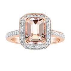 an orange and white diamond ring with two rows of diamonds around the band, set in 18k rose gold