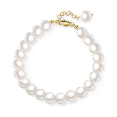 Adorn your wrist with this exquisite pearl bracelet, a testament to classic beauty and refined style. Each lustrous pearl delicately strung together, forming a captivating symphony of elegance and grace. Let its iridescent glow illuminate your every step, exuding an aura of sophistication that transcends trends and stands the test of time. Elevate your ensemble and make a statement that whispers of refined taste and timeless allure.Thickness: 8mm mmMaterial: CopperStone Type: PearlPlating Color: Luxury High Luster Gold Pearl Bracelet, Luxury Yellow Gold Plated Pearl Bracelet, Adjustable Gold-plated Pearl Bracelet For Formal Occasions, Luxury Gold-plated Pearl Bracelet, Luxury Elegant Gold-plated Pearl Bracelet, Bracelet Online, Anniversary Sale, Classic Beauty, Quality Jewelry