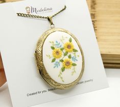 This is a handcrafted personalized locket necklace with 2 photos/messages inside, a detailed design from clay and metal base. Best gift ideas for mother, wife, sister, aunt, daughter, or grandmother for Mother's Day, wedding, her birthday, or other occasions. 🍃HANDCRAFTING AND PROCESSING TIME This jewelry is already made and is ready to be personalized with photos/text for you. I create by hand each piece of jewelry, the design is intricate and delicate. The time to create such jewelry is long, Heirloom Jewelry Gift For Mother's Day, Heirloom Jewelry For Mother's Day Gift, Handmade Heirloom Necklaces For Keepsake, Handmade Heirloom Necklace For Keepsake, Flower Pendant Locket Jewelry For Wedding, Flower Jewelry For Wedding And Mother's Day, Wedding Jewelry Flower Locket Pendant, Wedding Flower Pendant Locket Jewelry, Flower Shaped Locket Jewelry For Wedding