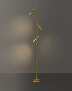 a floor lamp with three lights on each side and one light on the other side