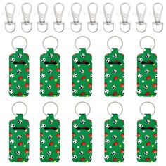 six green luggage tags with soccer balls on them