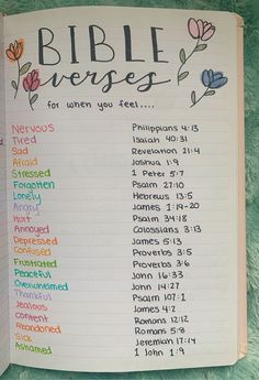 an open bible with flowers and the names of the ten things that are in it