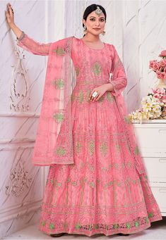 Net Abaya Style Kameez in Pink This Semi-stitched attire with Poly Shantoon Lining is Enhanced with Resham Work. Carved in Round Neck and Quarter Sleeve Available with a Poly Shantoon Pant in Pink and a Net Dupatta in Pink The Kameez and Bottom Lengths are 54 and 38 inches respectively Do note: Accessories shown in the image are for presentation purposes only and length may vary upto 2 inches.(Slight variation in actual color vs. image is possible). Bollywood Gowns, Pink Anarkali Suits, Net Anarkali, Shalwar Suit, Indian Suits For Women, Resham Work, Embroidered Anarkali, Elegant Outfit Classy, Suit Salwar