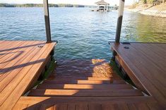 the steps lead down to the water from the dock