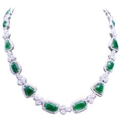 An exclusive design, so refined and glamour , a very piece of art, by Italian designer. Necklace come in 18k gold with 14 pieces of natural untreated Jades , excellent quality, of 18.68 carats, from Myanmar, in cabochon cut, in amazing green , and 991 pieces of natural diamonds of 7.66 carats, F color and VS clarity. It is a high jewels piece. Handcrafted by artisan goldsmith. Excellent manufacture and quality. Complete with AIG report. Length is about 18 inches, but it is resizable on request. Green Diamond Necklace For Formal Occasions, Formal Green Hallmarked Diamond Necklace, Luxury Pear-shaped Emerald Gemstone Necklace, Exquisite Pear-shaped Emerald Necklace For Formal Occasions, Elegant Baguette Cut Emerald Necklace For Formal Occasions, Elegant Baguette Cut Emerald Necklace For Formal Events, Dazzling Formal Emerald Gemstone Necklace, Pear-shaped Emerald Gemstone Necklace For Formal Occasions, Pear-shaped Emerald Gemstone Necklace For Formal Events