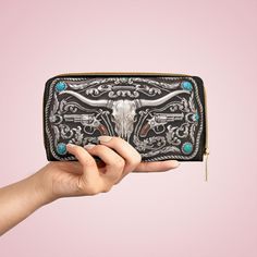 For carrying around all your credit cards, cash, and driver's licenses, look no further than this personalized wallet. Crafted with cruelty-free faux leather, this zipper wallet combines rugged Western style with modern functionality. The flat, 3D-looking image of a silver engraved belt buckle showcases a majestic Longhorn, flanked by turquoise stones and diamonds, capturing the timeless elegance of the Wild West. With durable high-quality nylon zip, alloy hardware, and gold color thread stitchi Turquoise Rectangular Wallet For Everyday Use, Western Belt Buckles, Western Belt, Personalized Wallet, Western Design, Clip Wallet, Western Belts, The Wild West, Turquoise Stones