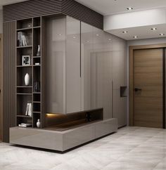 a modern living room with white tile flooring and wooden accents on the walls, along with built - in shelving