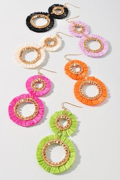 The Double Raffia Edge Dangle Earrings are a stylish and trendy accessory that is perfect for adding a touch of elegance to your Ramadan or summer outfit. These earrings feature a double layer of raffia fringe that creates a unique and eye-catching texture. They are designed to dangle from your ears, adding movement and flair to your overall look. The neutral color of the raffia makes them easy to pair with a variety of outfits and the lightweight design ensures they are comfortable to wear all Tassel Jewelry For Vacation, Chic Multicolor Summer Jewelry, Dangle Beaded Earrings For Summer Parties, Multicolor Woven Jewelry For Summer, Summer Party Beaded Dangle Earrings, Summer Multicolor Woven Jewelry, Summer Party Beaded Drop Earrings, Beach Dangle Chandelier Earrings With Tassels, Trendy Summer Earrings