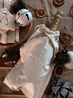 a bottle of champagne sitting on top of a table next to other items and decorations