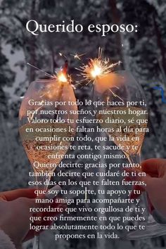 two people holding sparklers in their hands with the words querido esposo