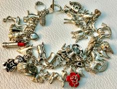 40 Vintage Sterling Silver ANIMALS Charm Bracelet MINIATURES Movers Brown County Basket. Approx: - 7.25” long. I can make it a pinch longer if you need that. In excellent otherwise untested vintage condition. My home is smoke & pet free. Returns are not accepted. I will be happy to combine shipping if it can work out.  International Buyers; Import dues, taxes and charges are the buyers responsibility ! They are not included in the item cost or shipping. Please be aware of your Country's Customs fees before you bid. Vintage Adjustable Charm Bracelet Collectible, Maximalist Rings, Brown County, Vintage Charm Bracelet, Vintage Trends, Best Sleeve Tattoos, Silver Charm Bracelet, Long I, Bracelets And Charms