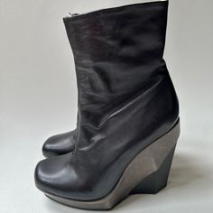 Allsaints Spitafields Wedge Booties Euro Size: 38 Us; 8 Color: Black With Gray Distressed Leather Heel Accent Soft Lambskin Upper Square-Toe Inner Leg Zip Closure 1" Platform 5" Wedge Heels Leather Insoles Man Made Soles Great Condition! Scuff Markings On Leather Heel Are A Specialty Of Allsaints. They Manufacturer Their Products To Look Worn, Distressed. Black Leather Wedge Boots With Sculpted Heel, Iconic Fashion, Distressed Leather, All Saints, Leather Heels, Wedge Heels, New Style, Boots Booties, Bootie Boots