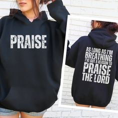 Wrap yourself in the warmth of worship with our exclusive front and back designed sweatshirt, adorned with the timeless lyrics of Brandon Lake's "Praise the Lord" anthem. 🎶 "As long as I'm breathing I've got a reason to praise the Lord" 🎶 Crafted to merge style with spirituality, our sweatshirt boasts premium DTG printing on a cozy Gildan Hoodie or Crewneck Sweatshirt, available in sizes S to 3XL. With a spectrum of colors to choose from, finding your perfect match is effortless. Whether you're gearing up for a Brandon Lake concert or seeking a heartfelt gift for a loved one, our sweatshirt is the epitome of Christian chic. Key Features: 🙏 Inspirational "Praise the Lord" lyrics by Brandon Lake 👕 High-quality Gildan Hoodie or Crewneck Sweatshirt for ultimate comfort 🎨 Multiple vibrant Inspirational Long Sleeve Hoodie For Fall, Inspirational Long Sleeve Relaxed Fit Hoodie, Christian Hoodies, Gildan Hoodie, Christian Designs, Christian Sweatshirt, Suits You, Tshirt Colors, Comfort Colors