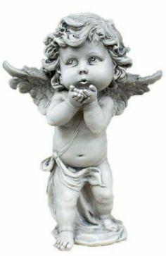 an angel figurine is shown with its hands in his mouth and eyes closed