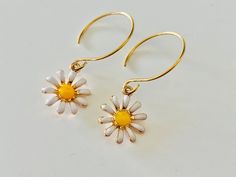 Daisy Earrings Little White Yellow Daisy Dangles Vintage - Etsy White Daisy-shaped Hypoallergenic Flower Earrings, White Daisy-shaped Jewelry For Spring, White Daisy-shaped Spring Jewelry, Gold Daisy Earrings With Flower Charm, Vintage White Flower Drop Earrings, Gold Daisy Flower Earrings As Gift, Yellow Daisy-shaped Jewelry Gift, Yellow Daisy Shaped Jewelry Gift, Vintage White Dangle Flower Earrings