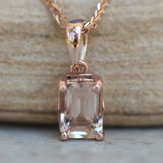 This Emerald Cut Morganite Pendant is part of our Lola Collection, which is characterized by a gorgeous, genuine gemstones held in place atop a Filigree Setting. Center Stone: Genuine AAA Peachy Pink Morganite, Emerald Cut, averaging 7x5mm and 0.90 carat. All shapes, sizes and gemstones available upon request! Chain sold separately. BUY THE CHAIN HERE: https://www.etsy.com/shop/LaurieSarahDesigns?ref=seller-platform-mcnav§ion_id=5874586 We are a Truly Handmade, Family/Woman Owned business.  My h Morganite Pendant, Filigree Jewelry, Pink Morganite, Rose Gold Pendant, Morganite Ring, Aquamarine Gemstone, Best Diamond, Peachy Pink, Bridal Necklace