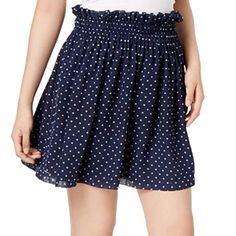 Description: Lovely Navy Blue Polka Dotted Mini Skirt From Maison Jules With Ruffled Elastic Waistband And Pockets. Skirt Is Super Flowy And Swishy - Perfect For Twirling In! Skirt Has Navy Blue Liner Underneath. The First Photo Is Not Mine. It Is A Stock Photograph Included For Some Perspective On What It Would Look Like On. Condition: Received As A Gift But It Didn't Fit Me Quite Right, Never Worn With No Flaws. New With Tags. See Pictures For Measurements Casual Polka Dot Skirt With Elastic Waistband, Casual Polka Dot Pleated Skirt, Casual Polka Dot Mini Bottoms, Casual Polka Dot Flowy Skirt, Casual Polka Dot Ruffled Skirt, Casual Ruffled Polka Dot Skirt, Casual Polka Dot Lined Skirt, Casual Polka Dot Tiered Skirt, Summer Casual Polka Dot Skirt