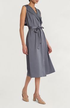 Satin accents lend casual elegance to a modern take on the classic shirtdress silhouette. 47" length (size Medium) True wrap style Surplice V-neck; shawl collar Sleeveless Unlined 100% polyester Machine wash, dry flat Imported Classic V-neck Midi Dress For Summer, Chic Solid Color A-line Shirt Dress, Classic V-neck Shirt Dress For Work, Chic V-neck Short Sleeve Dress For Fall, Elegant V-neck Sleeveless Dress For Day Out, Feminine V-neck Shirt Dress For Summer, Elegant V-neck Dress For Fall Day Out, Knee-length Wrap Dress For Day Out, Elegant Midi Dress With Tie Waist For Daywear