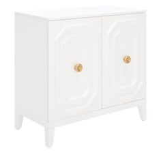 a white cabinet with two doors and gold knobs on the front, against a white background