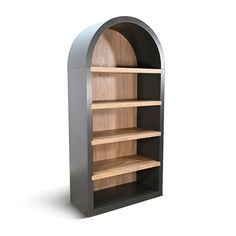 an arch shaped bookcase with wooden shelves on each side and black metal trim around the edges