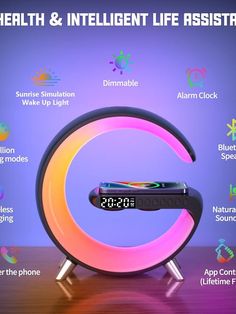 an alarm clock with the words health and intelligent life assistance on it's display