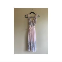 Floral Midi Wrap Dress, Spring/Summer, Women’s, Sleeveless, Pale Pink With Flowers, Never Worn. Feminine Sleeveless Midi Dress For Beach, Pink Sleeveless Dress For Beach In Spring, Feminine Sleeveless Dress For Spring Daywear, Flowy Sleeveless Feminine Sundress, Flowy Feminine Sleeveless Sundress, Feminine Sleeveless Midi Dress For Vacation, Pink V-neck Sleeveless Sundress, Pink Floral Print Sleeveless Dress For Beach, Pink Floral Print Sleeveless Dress For The Beach