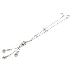 This Bvlgari Lariat necklace is an easy addition to any collection. The elegant 18K white gold piece can be worn as part of a stack or used as a stand alone piece. The chain is intertwined with 4 white gold, round pendants set with diamonds. A central, barrel shaped pendant is set with two diamond rows. Swaying beneath the pendant are 3 independent chains holding smaller round disks also set with diamonds. At its longest, the necklace can be worn as an 18 in. piece. The chain is fitted with with Gold Lariat Necklace, White Gold Pendant Necklace, White Gold Necklaces, Gold Piece, Modern Necklaces, Lariat Necklace, Round Pendant, Gold Jewelry Fashion, Gold Pendant Necklace