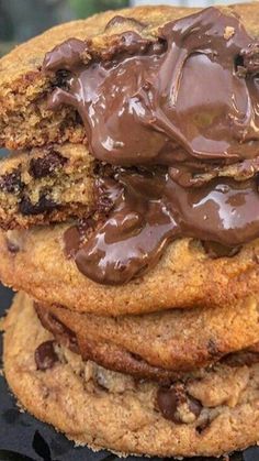 chocolate chip cookies stacked on top of each other