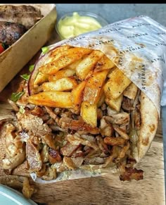 a close up of a sandwich on a cutting board