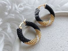 💖 These handmade black and gold seed bead beaded hoop earrings are the perfect accessory for any occasion. Whether you're looking for a unique gift for your sister-in-law's birthday or any jewelry lover in your life, these statement earrings are sure to impress. Surprise her with these eye-catching earrings that are sure to make a stylish statement wherever she goes. Plus, they are ready to ship, so you can enjoy them in no time! Add a touch of glam to any outfit with these unique chunky hoop e Sister In Law Birthday Gift, Seed Bead Hoop Earrings, Sister In Law Birthday, Bead Hoop Earrings, Gifts For Your Sister, Surprise Her, Hoop Earrings Gold, Black Seed, Beaded Hoop Earrings