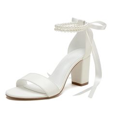 a women's white high heeled sandal with pearls on the ankle strap