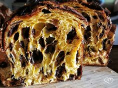 a loaf of chocolate chip bread on a cutting board