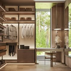 a walk in closet with clothes hanging on the walls and shelves, along with a stool