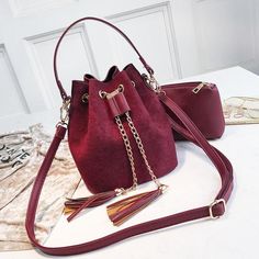 Specifications: Main Material: PU Shape: Bucket Lining Material: Polyester Number of Handles/Straps: Single Decoration: Tassel Closure Type: String Interior: No Pocket Hardness: Soft Pattern Type: Solid PU Leather Bag Size: 20*17*13 cm/7.87*6.69*5.11 inch Package Includes: 1*Selena Bucket Bag *Please allow 10-21 business days for the item to arrive Mini Handbags Leather, Bucket Handbags, Pu Leather Bag, Crossbody Handbags, Bucket Bags, Evening Handbag, Tassel Bag, Mini Handbags, Mini Crossbody Bag