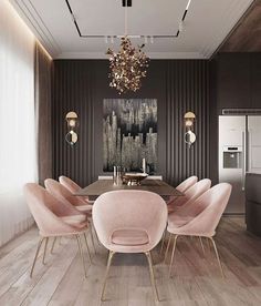 a dining room table with pink chairs and a chandelier