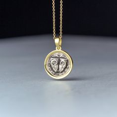 Delphi coin necklace, ancient greek disc pendant. -Oxidized silver set in 9k, 14k or 18k yellow, rose or white gold. -The pendant measures 1.5 cm/0.6 inches. You can buy the pendant with a chain or without a chain. It will be a 9k solid gold chain for the 9k pendant, a 14k solid gold chain for the 14k pendant and a 18k solid gold chain for the 18k pendant. Replica of an ancient coin made of 925 oxidized sterling silver set in solid yellow gold The coin is a replica of the 5th century BC Delphi c Elegant Handmade Coin Necklace, Handmade Elegant Coin Necklace, Amulet Style Yellow Gold Sterling Silver Coin Necklace, Amulet Sterling Silver Coin Necklace In Yellow Gold, Silver Byzantine Jewelry In 14k Gold, White Gold Byzantine Jewelry As Gift, White Gold Byzantine Jewelry Gift, Byzantine Style White Gold Jewelry As Gift, Byzantine Style White Gold Jewelry For Gift