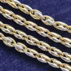 A fine quality necklace from Italian luxury designer Chimento, the fancy links made in 18ct yellow and white gold, fastened by a lobster claw clasp, with Chimento's stamp. Circa 2000's. With Italian (Vicenza) marks for 18ct gold. The chain measures approximately 500mm / 20 inches (L) x 4.9mm (W). The approximate weight is 25.9 grams. Please note that the antique box pictured is for display purposes only. Thank you. CONDITION: In very good vintage condition, with minimal surface wear commensurate with age. The clasp functions perfectly. LAYAWAY: We happily offer layaway/deposits on the majority of our items. Please send us a message if you would like to arrange a layaway. Layaways are not available on sale items. SHIPPING: All items are packed in a gift box and are sent securely within 1-3 Hallmarked Yellow Gold Oval Link Chain Necklace, Elegant Yellow Gold Chain Necklace With Lobster Clasp, Classic White Gold Chain Necklace, Elegant Hallmarked Link Chain Necklace, Yellow Gold Polished Chain Link Necklace, Formal Link Necklace With Lobster Clasp, Formal Round Chain Necklace With Spring Ring Clasp, Luxury Hallmarked Chain Link Necklace, Formal White Gold Figaro Chain Necklace