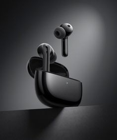 an image of two earphones that are in the air